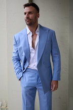 Celestial Splash sky blue suit on a model standing against an outdoor wall
