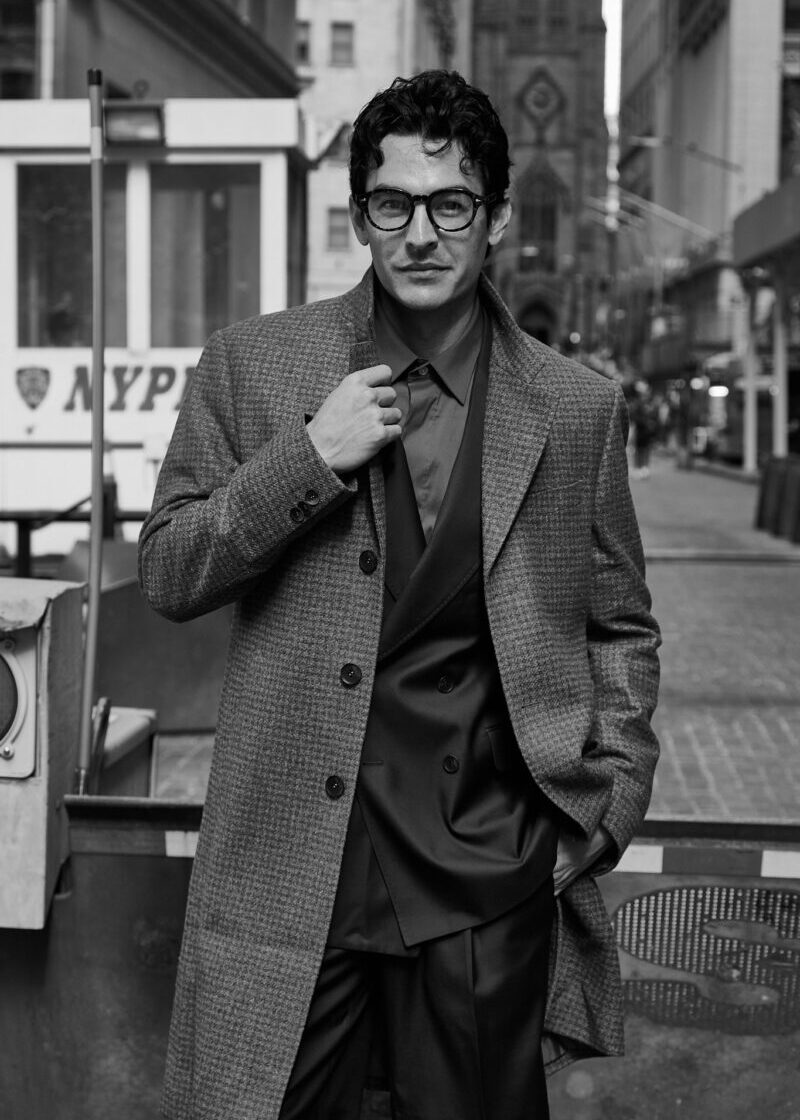 Brown Street Revival Sweeping Coat in black and white, worn open on a city street