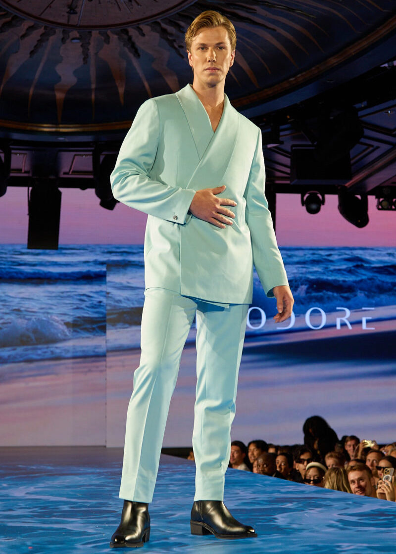 Mint Martini Suit worn by a runway model, hand on hip, three-quarter view
