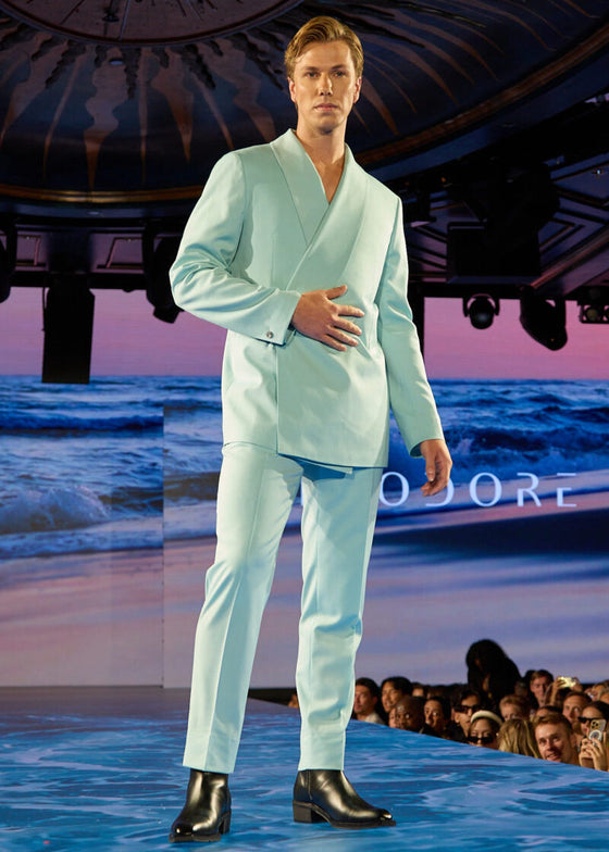 Mint Martini Suit worn by a runway model, hand on hip, three-quarter view