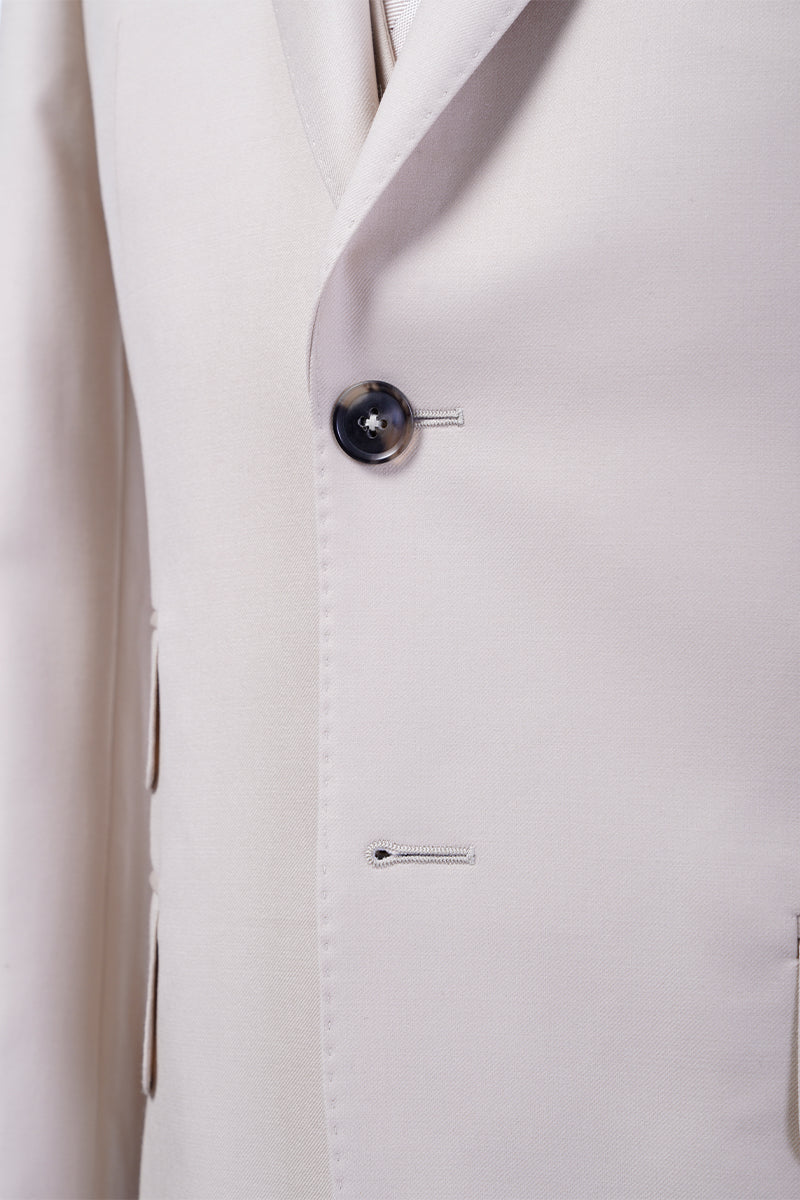 Close-up of the Opal Oasis suit's button and buttonhole detail