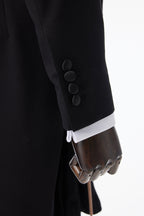Close-up of the Onyx Opulence Black Morning Coat sleeve cuff buttons and shirt cuff