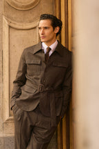 The Hawthorne Brown Jacquard Casual Set worn by a model leaning on a door