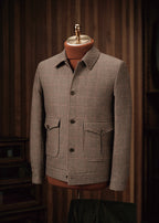 The Ginza Mocha Sports Jacket in a houndstooth check, displayed on a mannequin, front view