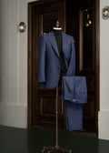 Michigan Avenue Check Navy Suit on a mannequin, styled with a black turtleneck