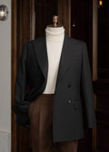 Haddington black jacket worn open on a mannequin over a cream turtleneck