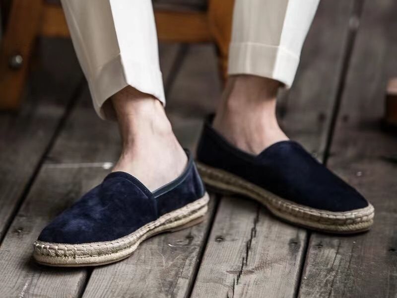 Aries Midnight Blue Handcrafted Woven Fisherman Shoes worn on a model on a deck