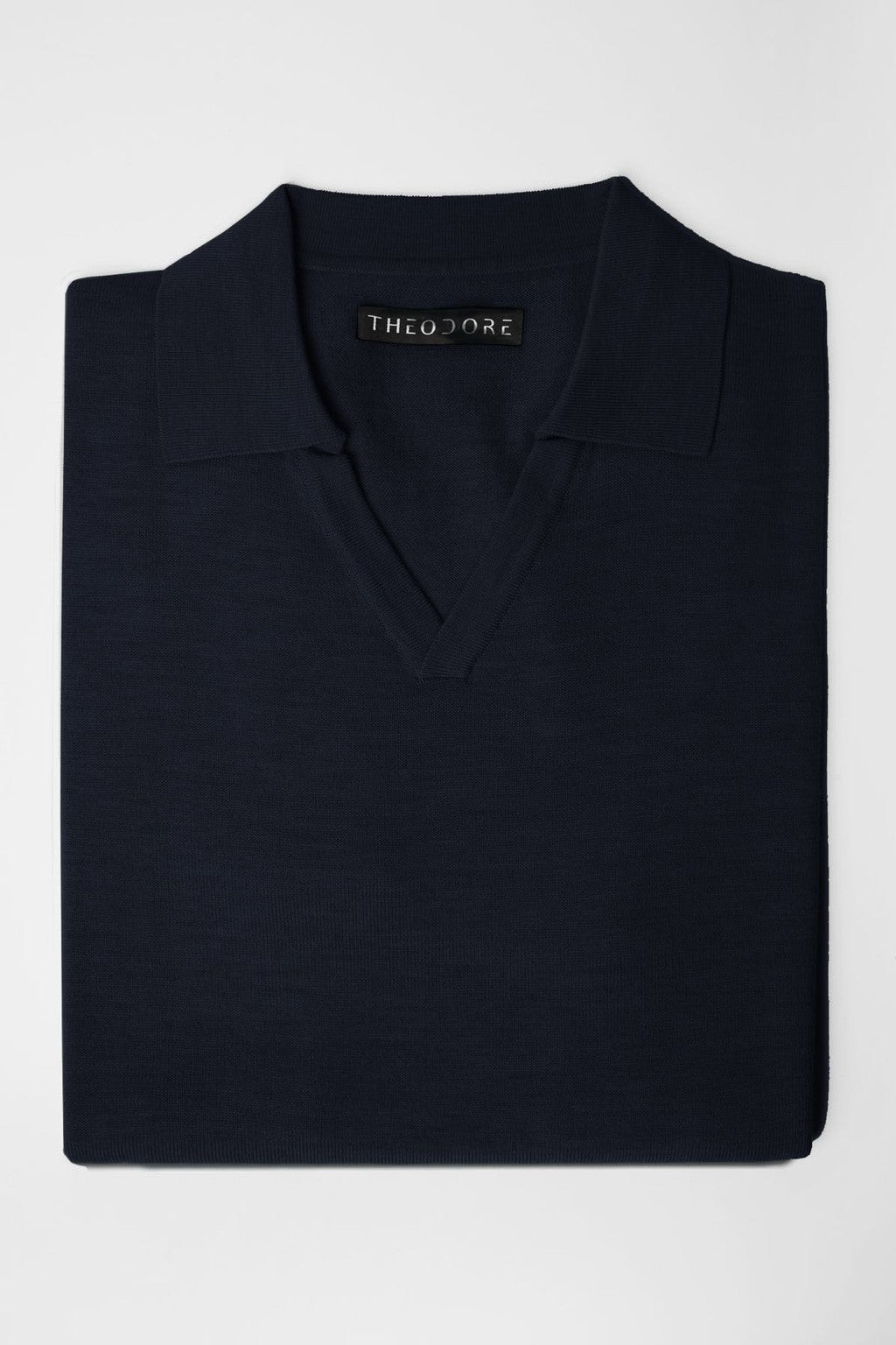 3J Whisky Shot Polo in navy, folded flat lay with open collar