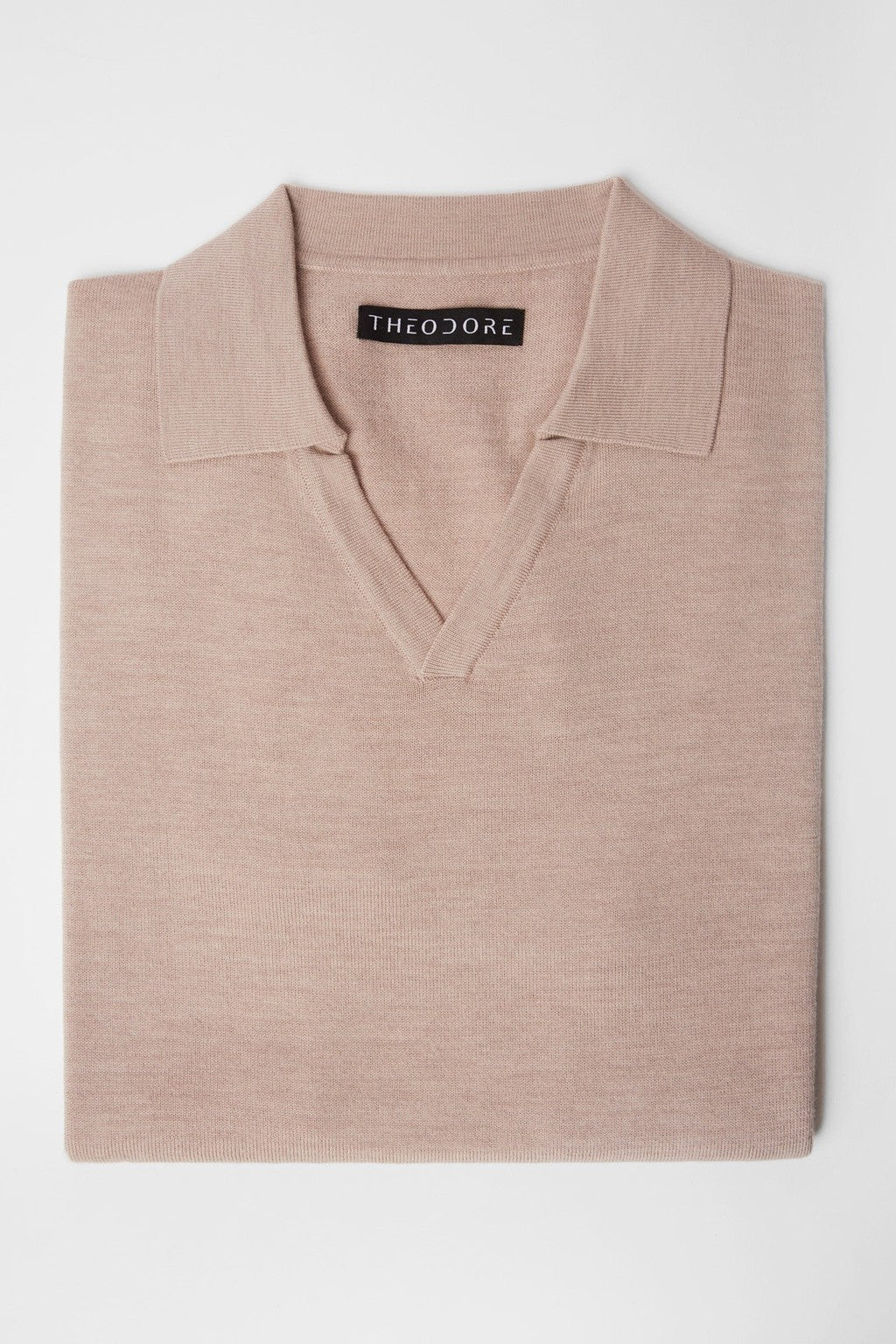 3J Whisky Shot Polo in oat, folded flat lay showing the open collar and label