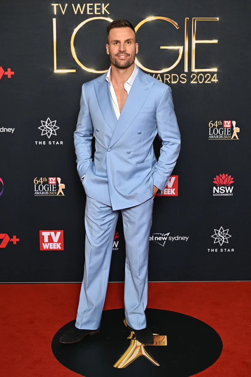 Celestial Splash sky blue suit worn on a model at a red carpet event