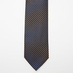 Chicago Tie in blue and gold micro polka dots, flat lay front view