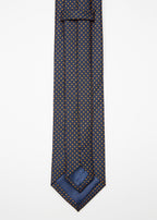Chicago Tie, angled flat lay with the tip turned back to show the lining