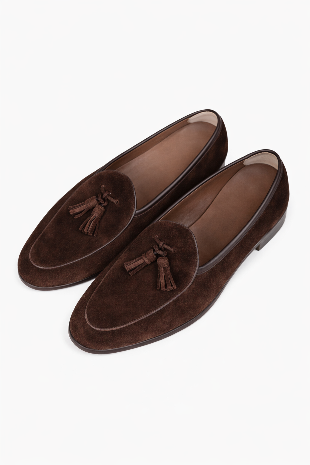 The Porto Brown Suede Tassel Loafer in dark brown suede, angled pair view