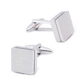 Times Square Silver Cufflinks, a pair of brushed square cufflinks on a plain background