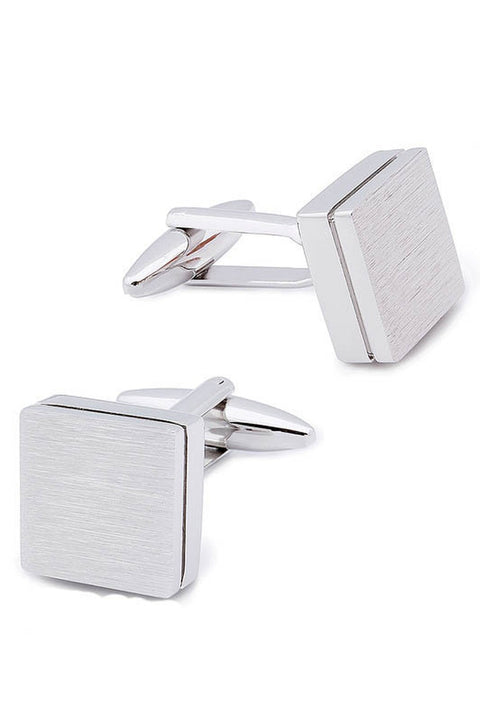 Times Square Silver Cufflinks, a pair of brushed square cufflinks on a plain background