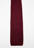 Paris Silk Knit Tie in the Burgundy colourway, straight flat lay on a plain background