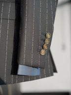 The No Filter Navy Pinstripe Suit, close-up of the cuff buttons and blue lining