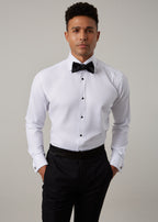 Close-up of the Glamorous Tuxedo Shirt front studs and bow tie on a model