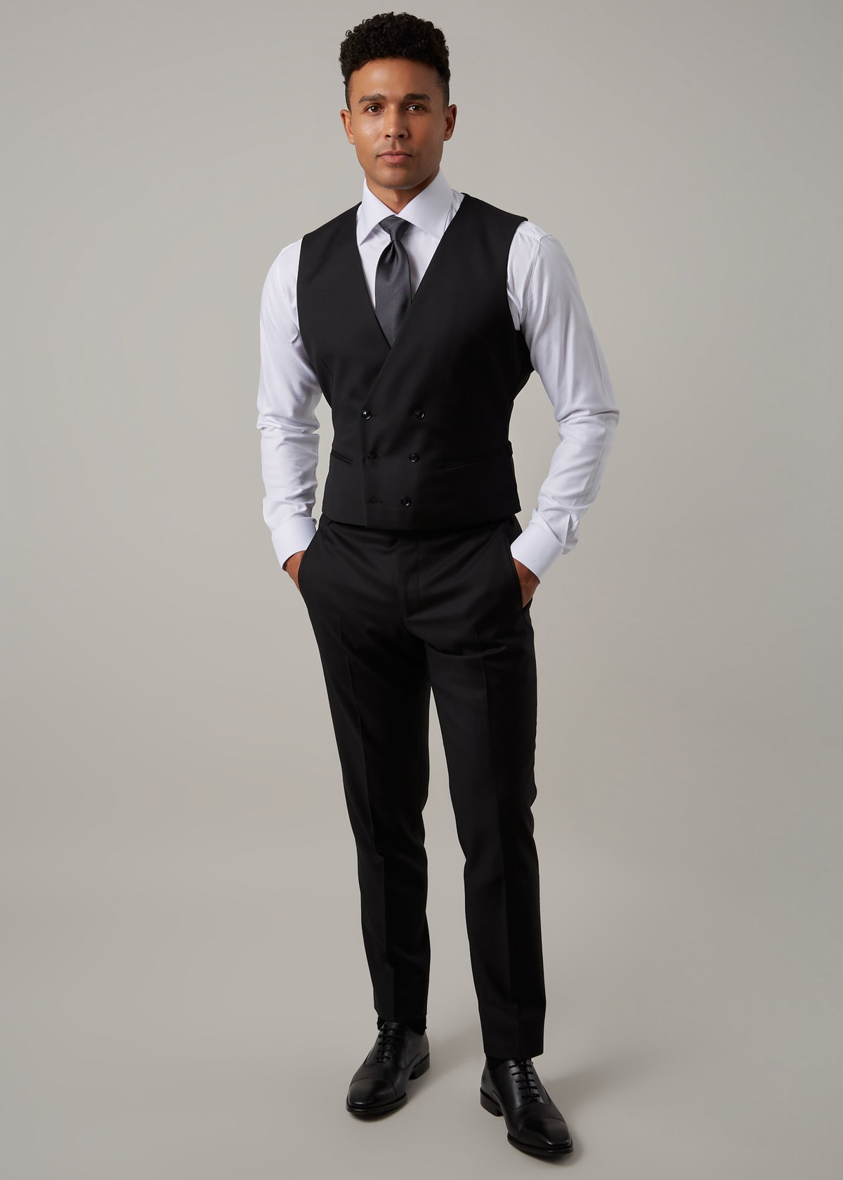 Midnight Milano The Ultimate Black Suit waistcoat worn full-length without the jacket