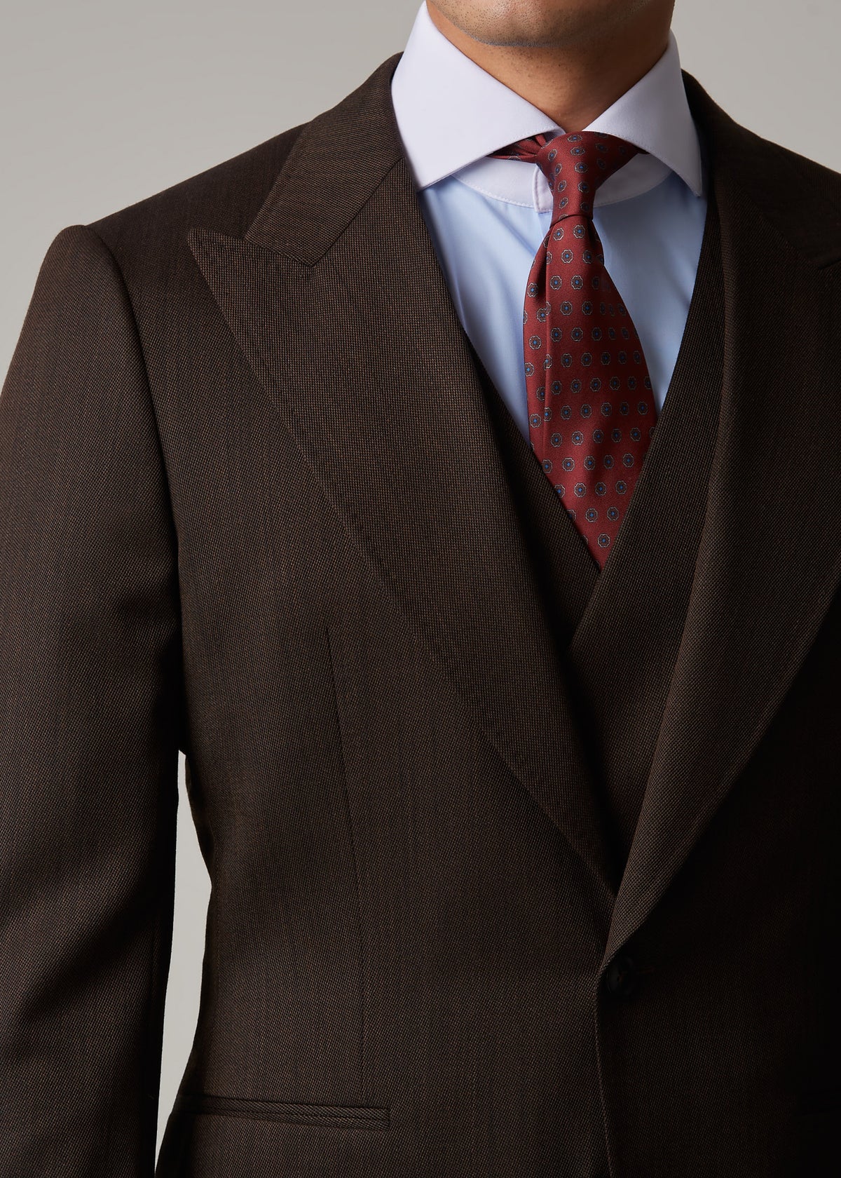 Lexington Brown Suit, close-up of the peak lapel, waistcoat and tie