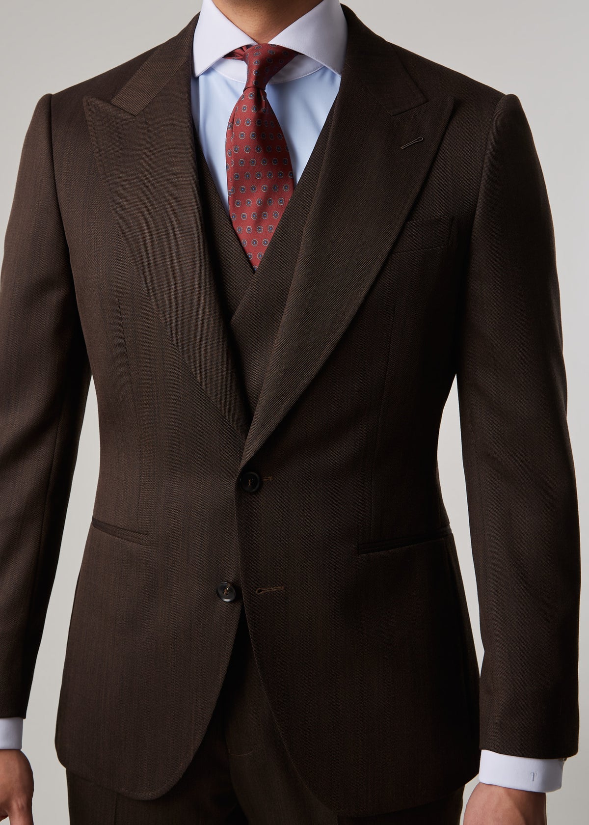 Lexington Brown Suit, close view of the jacket buttoned over the waistcoat