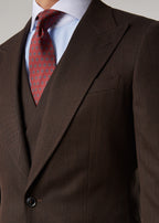 Lexington Brown Suit, cropped close-up of the buttoned jacket front and pockets
