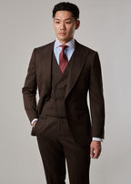 Lexington Brown Suit, torso view on a model with one hand in the trouser pocket
