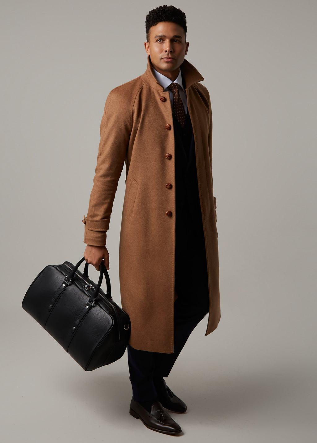 Toasty Truffle Cashmere Blend Overcoat full length front view holding a black bag