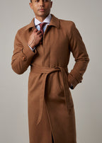 Toasty Truffle Cashmere Blend Overcoat belted and worn open, hand at the collar