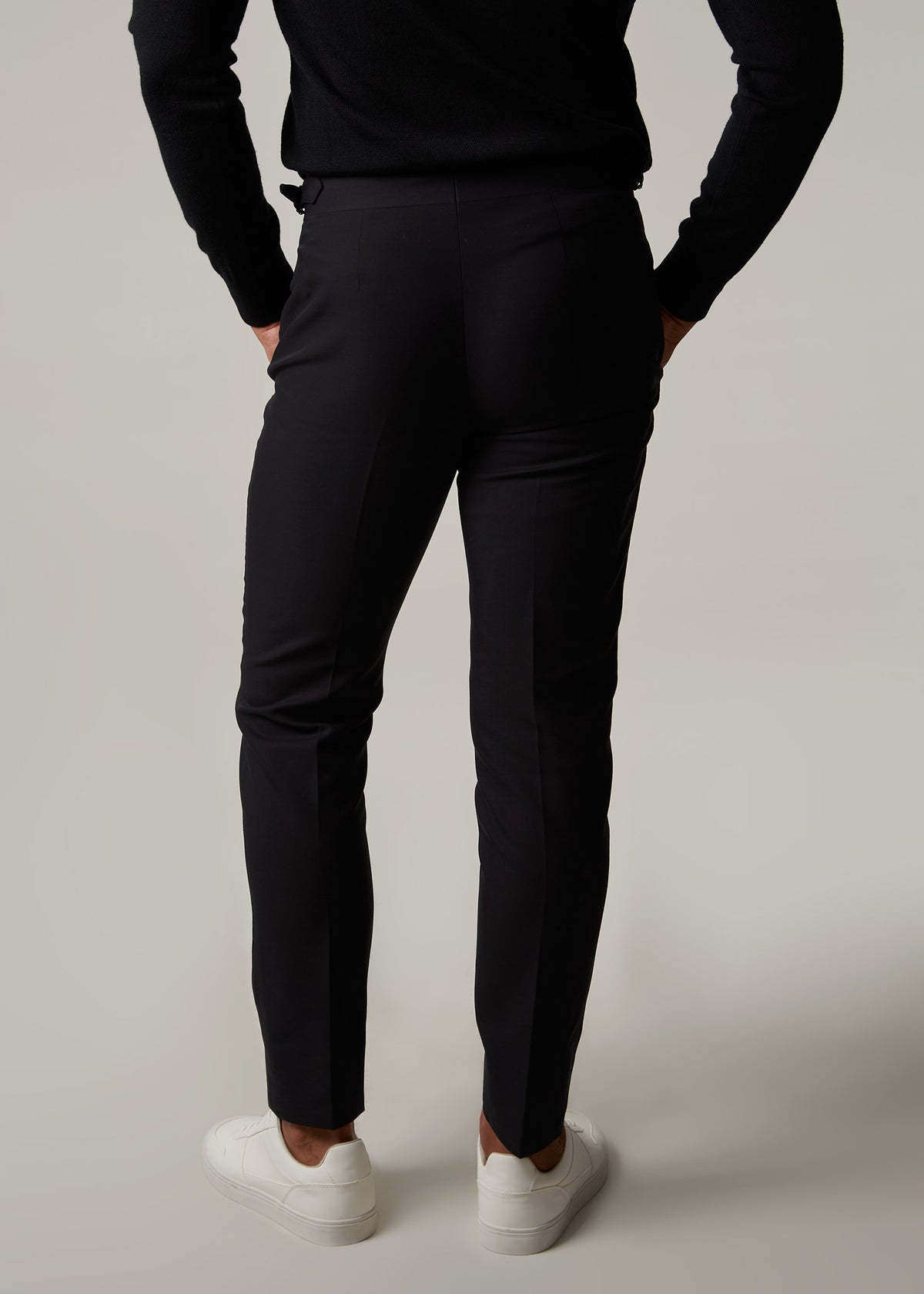 Gotham Noir Black Chinos, full-length back view on a model