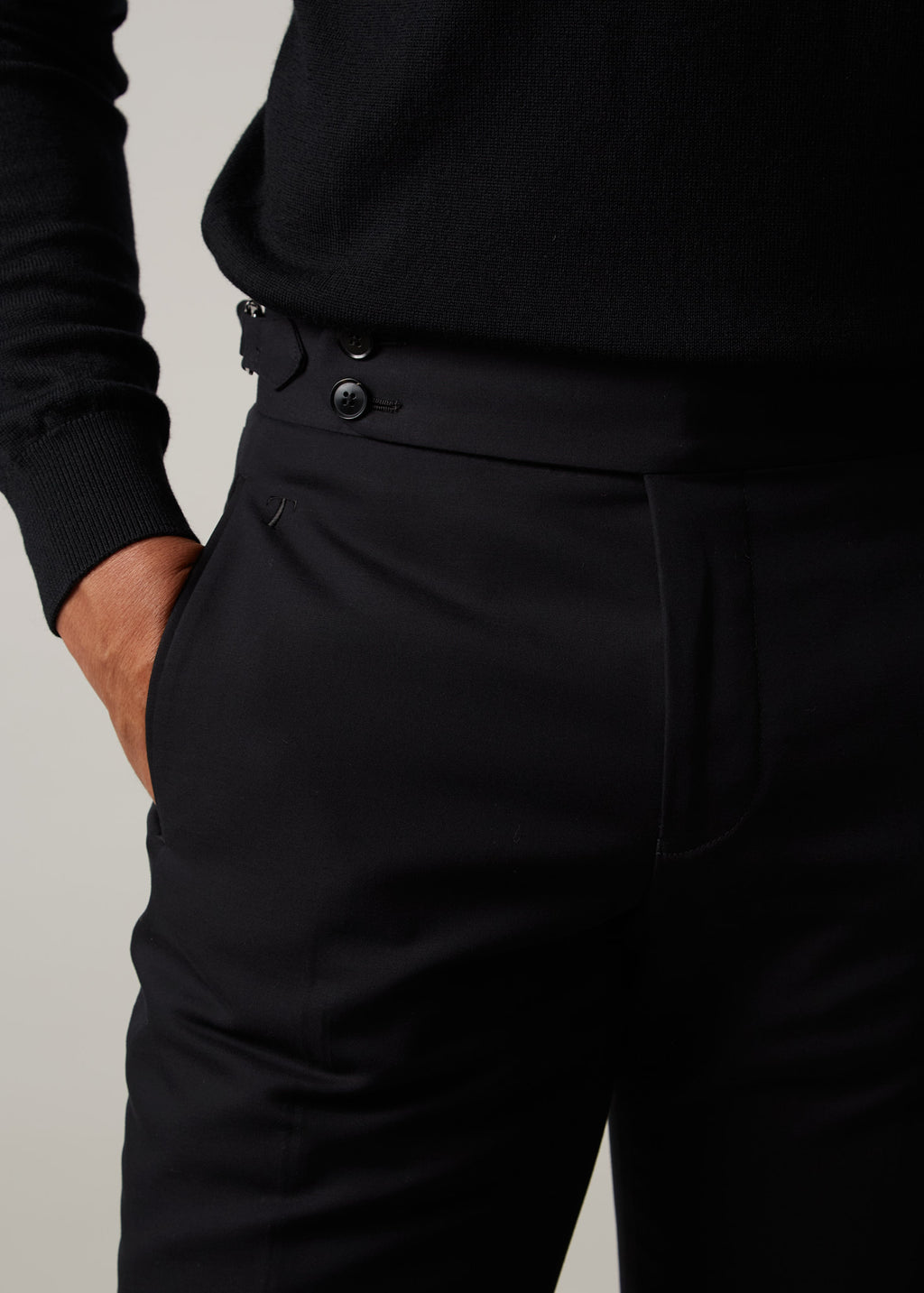 Gotham Noir Black Chinos, close-up of the waistband and side-adjuster buttons