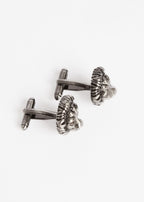 Gunmetal Lion Cufflinks pair, closer angled view with the fastening bars pointing right