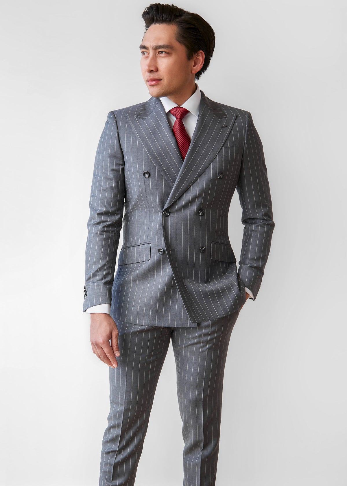Wall Street Charcoal Pinstripe Suit styled with a red tie, front view on a model