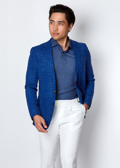 Blue Linen Blend Jacket on a model, standing at an angle with hand in pocket