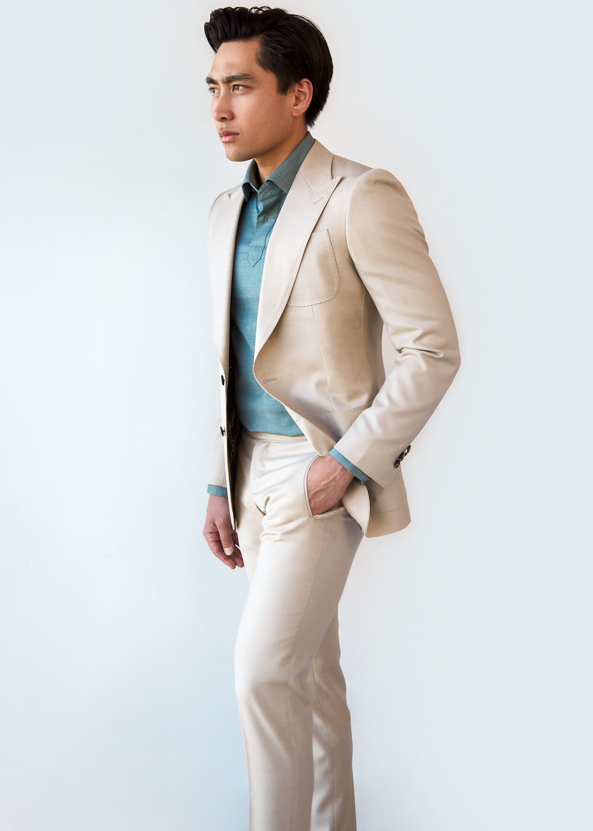 San Polo Cream Wool Suit, close front crop with both hands tucked into the pockets