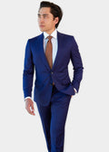 Monte Napoleone Royal Blue Suit, full front view on a model with a patterned tie