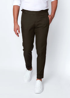 Olive Green Chino Pants with cuffed hems, front view on a model