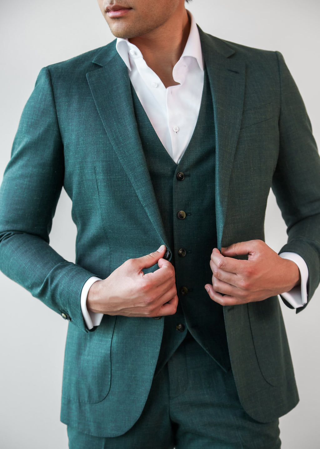 Taylor Square Green Wool-Linen Suit, close-up of the lapel and waistcoat