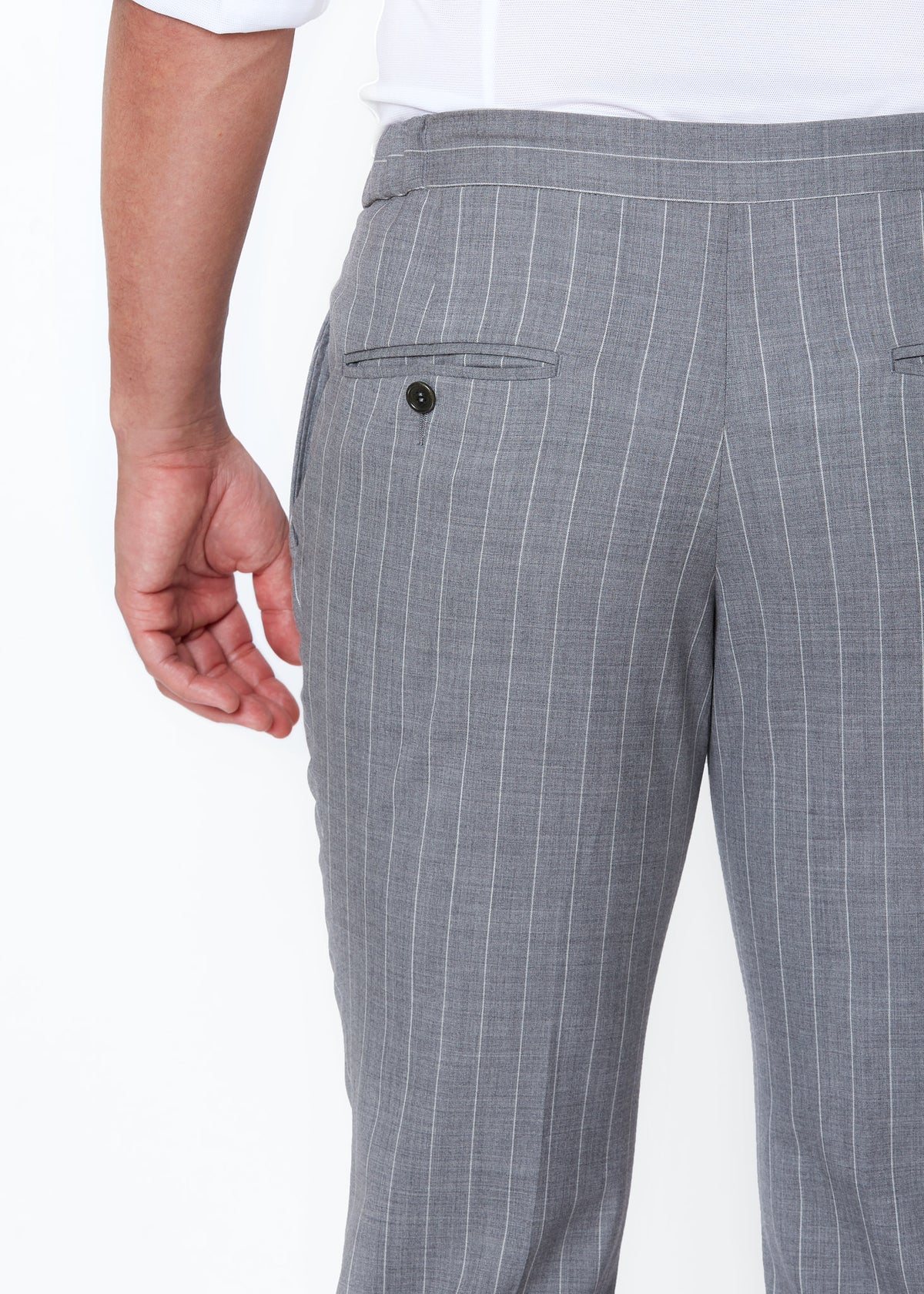 Close-up of the Grey Pinstripe Drawstring Pants back pocket and pinstripe weave