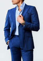 Sussex Blue Pinstripe Suit, angled view of a model with hand on the lapel