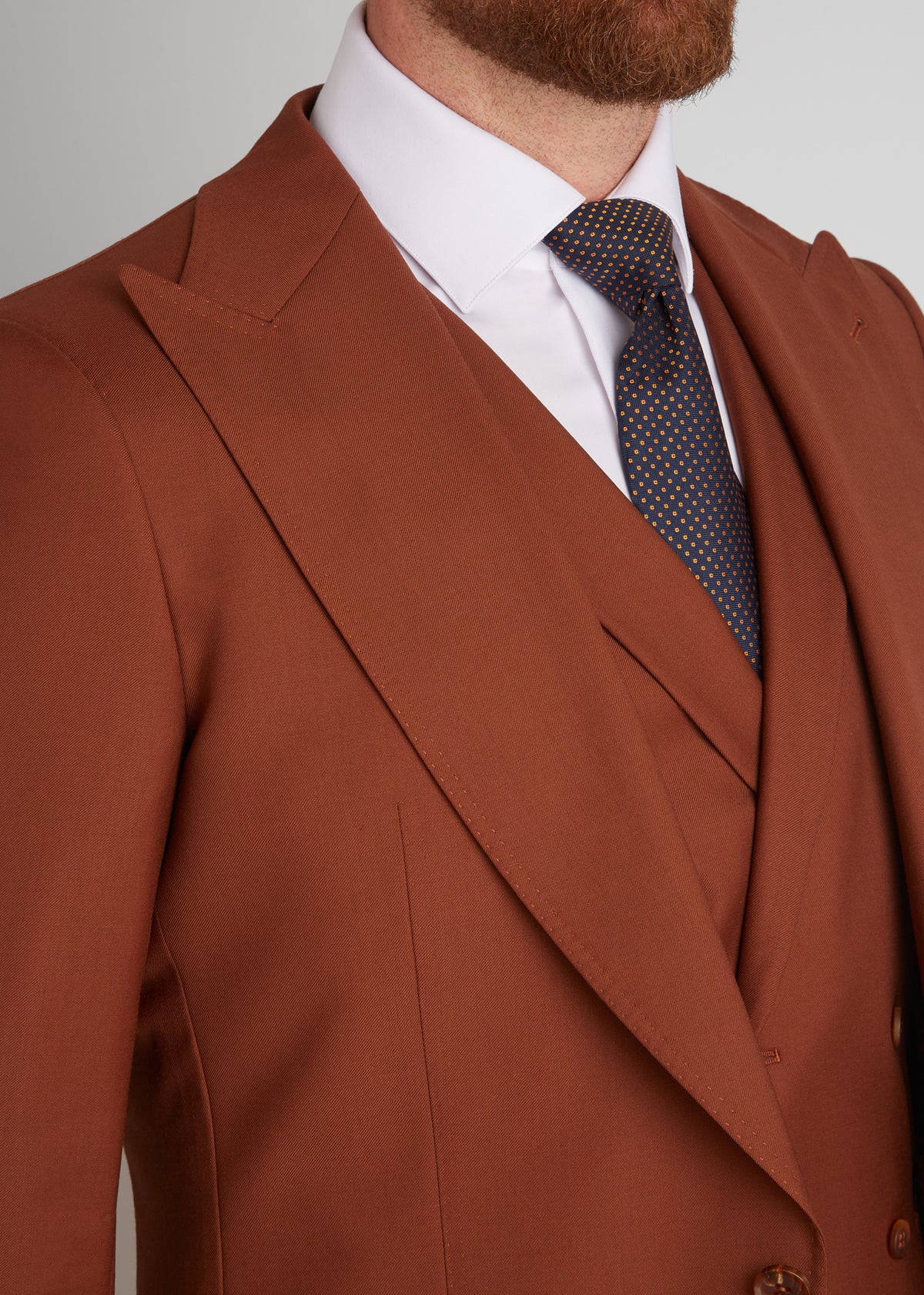 Birmingham Tobacco Brown Suit, close-up of the lapel and patterned tie