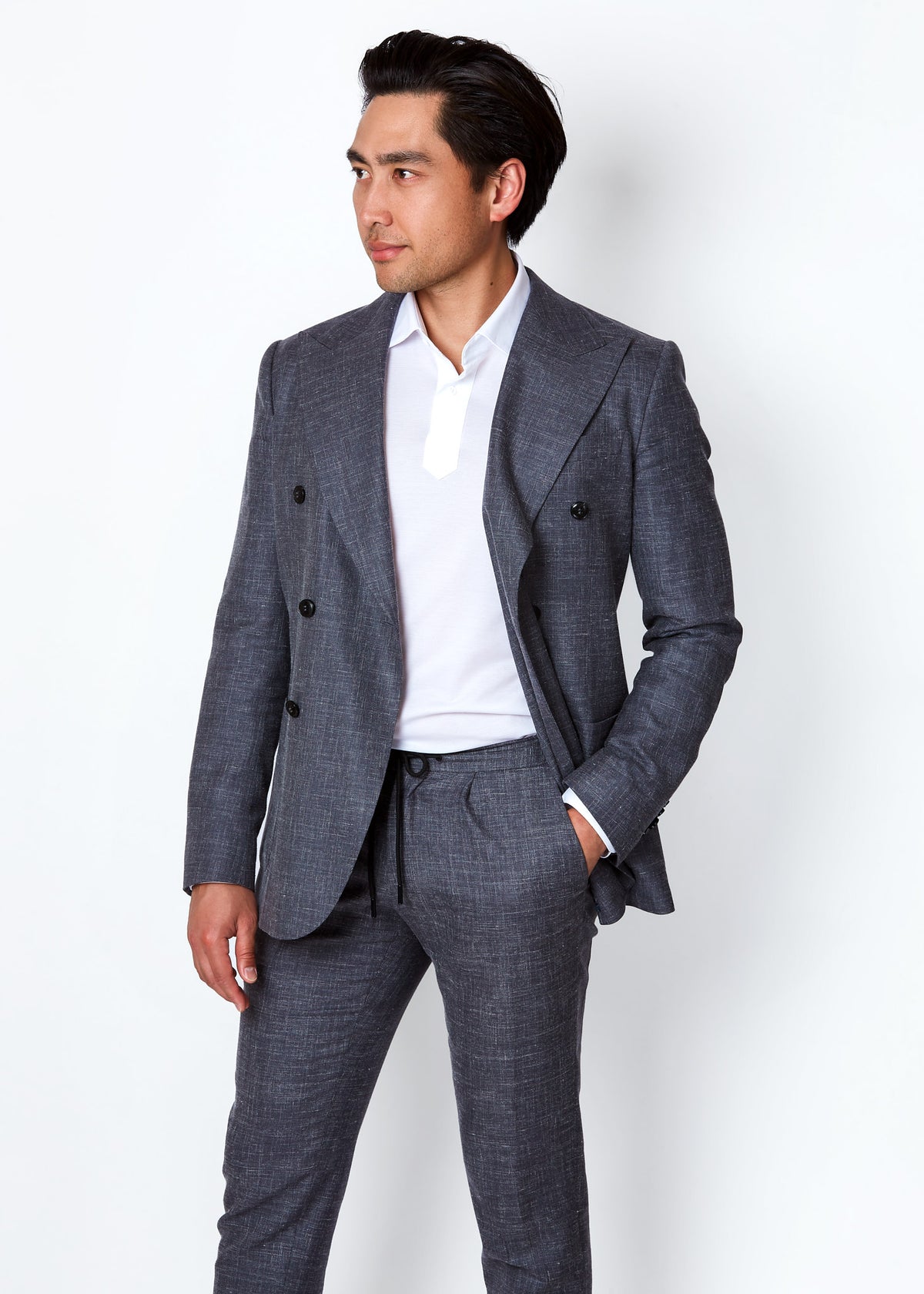 Fitzroy Charcoal Double Breasted Linen Blend Jacket worn open over a white polo
