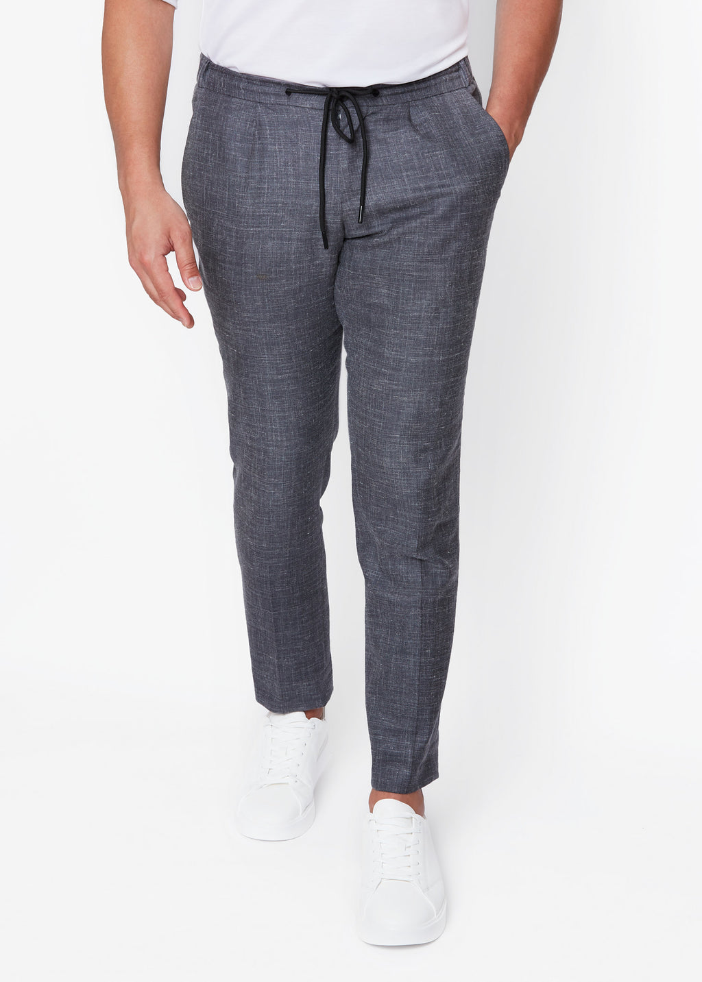 Fitzroy Charcoal Drawstring Pants on a model, front view with white sneakers