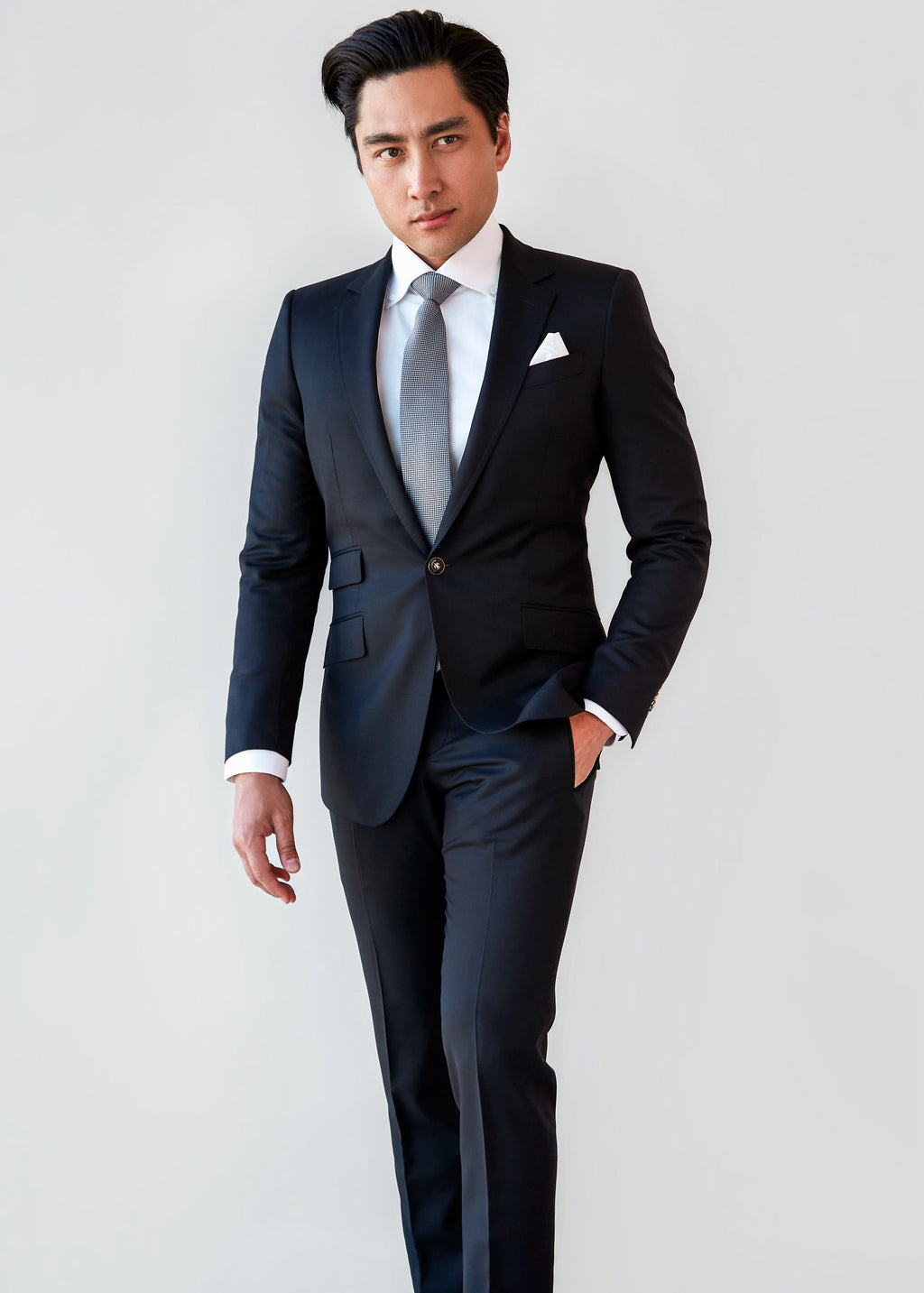 High Street Classic Black Suit on a model, full front view with a grey tie