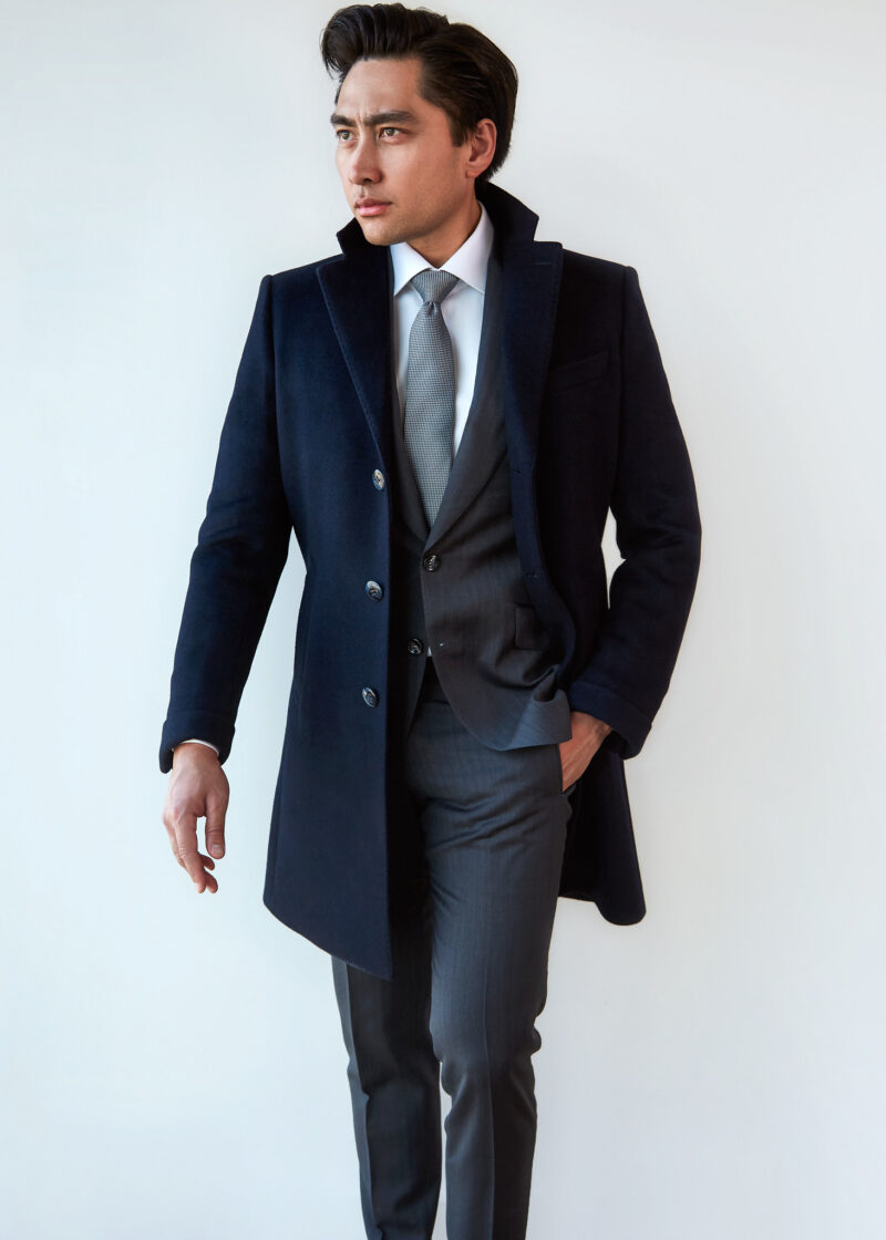 Bond Street Cashmere Blend Navy Overcoat worn open over a grey suit by a model