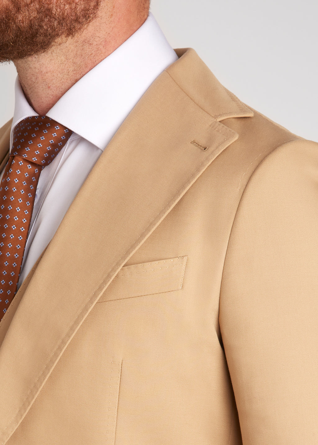 Berkeley Beige Suit, close-up of the lapel and chest pocket at a three-quarter angle