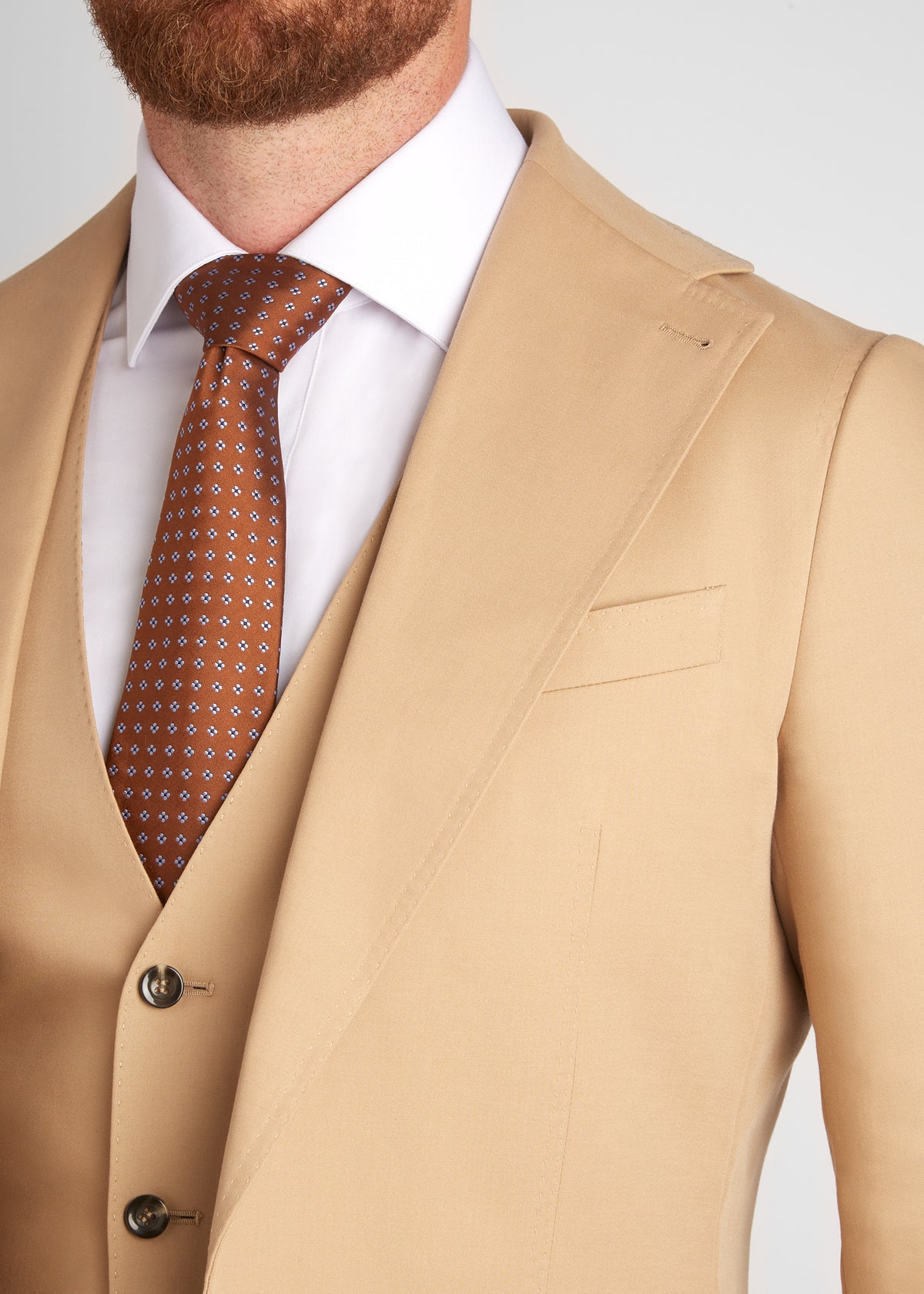 Berkeley Beige Suit, centred close-up of both lapels and the patterned tie
