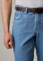 Light Blue Denim Jeans, close-up of the front pocket and belt buckle