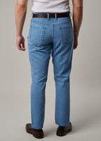 Light Blue Denim Jeans, full back view on a model showing both back pockets