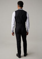 The Great Black Tuxedo waistcoat back view on a model, showing the back strap